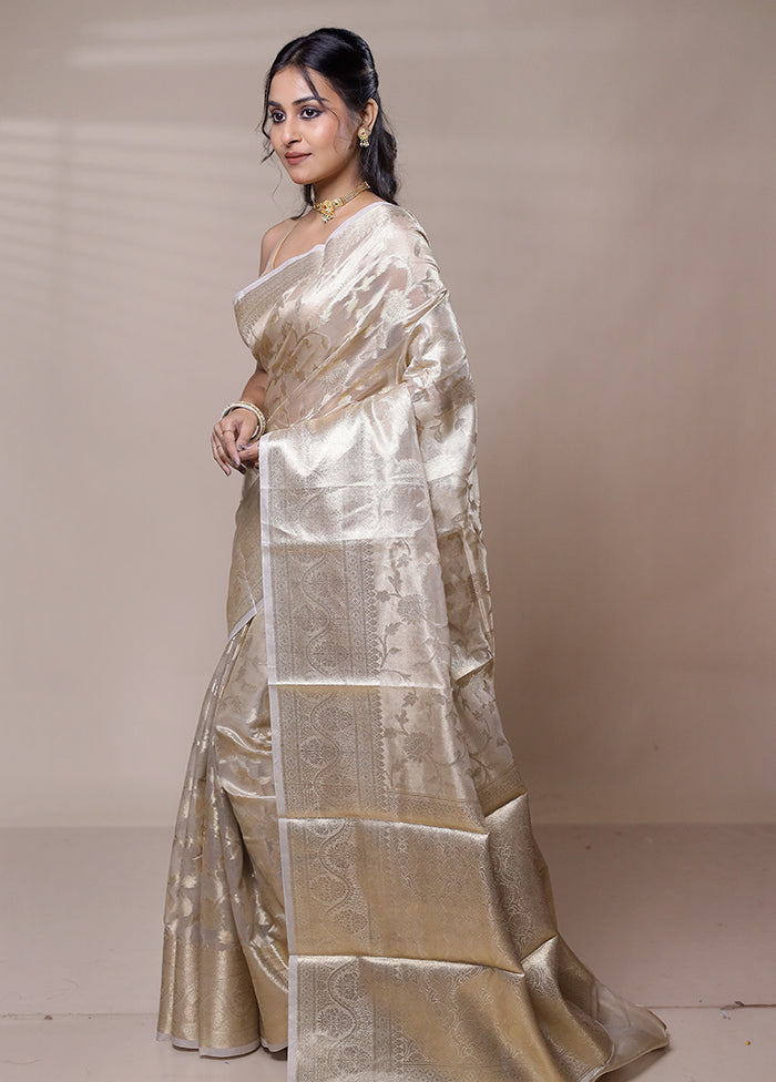 Cream Tissue Silk Saree With Blouse Piece