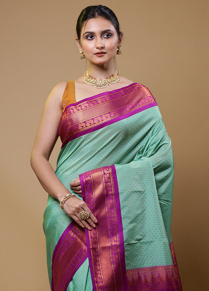 Green Kanjivaram Silk Saree With Blouse Piece