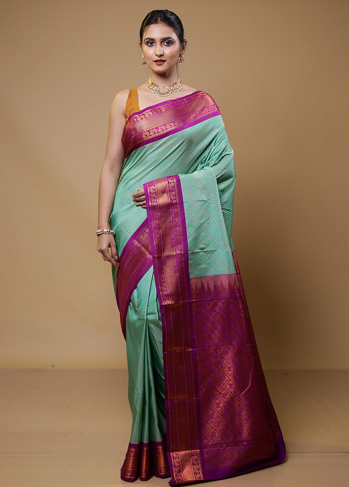 Green Kanjivaram Silk Saree With Blouse Piece