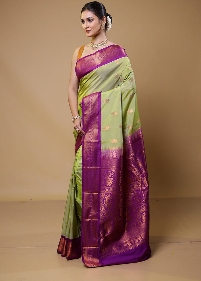 Green Kanjivaram Silk Saree With Blouse Piece