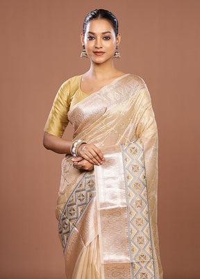 Cream Tissue Silk Saree With Blouse Piece