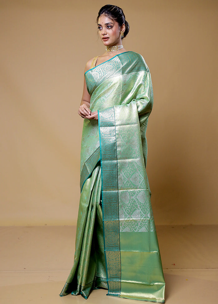 Green Kanjivaram Silk Saree With Blouse Piece