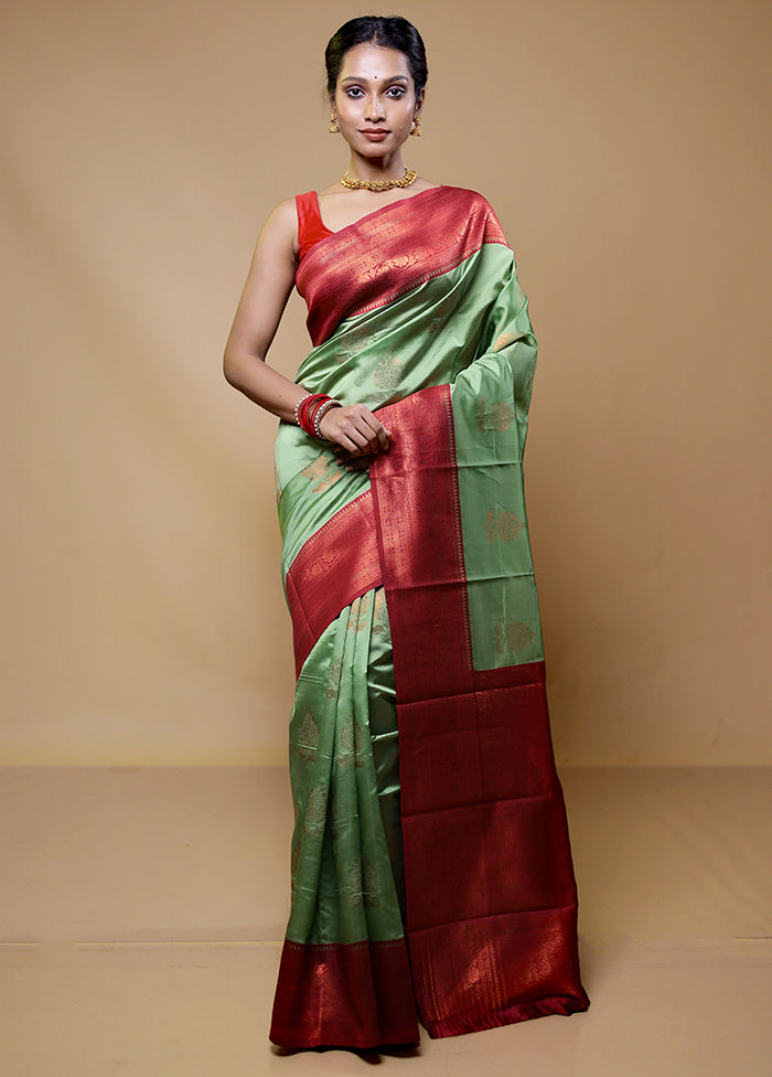 Green Kanjivaram Silk Saree With Blouse Piece