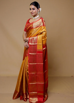 Yellow Kanjivaram Silk Saree With Blouse Piece