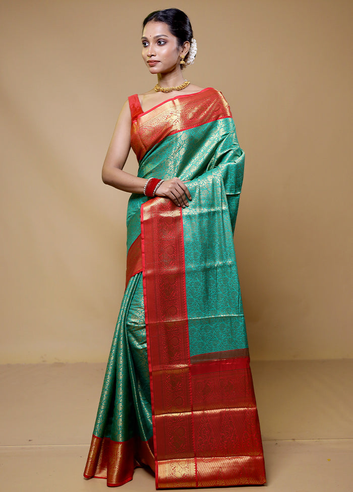 Green Kanjivaram Silk Saree With Blouse Piece