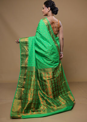 Green Kanjivaram Silk Saree With Blouse Piece