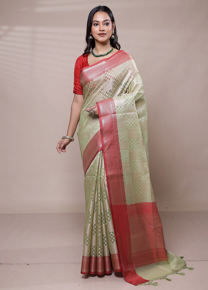 Green Tissue Silk Saree With Blouse Piece