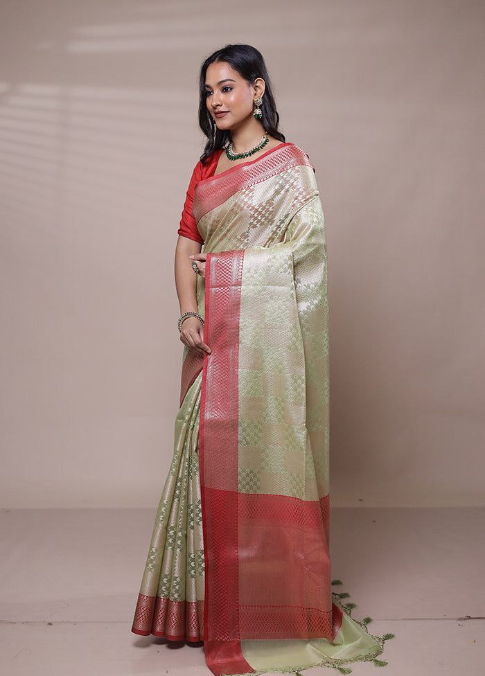 Green Tissue Silk Saree With Blouse Piece