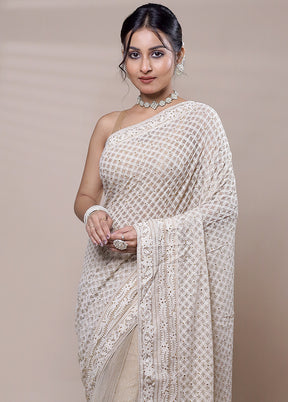 Cream Net Saree With Blouse Piece