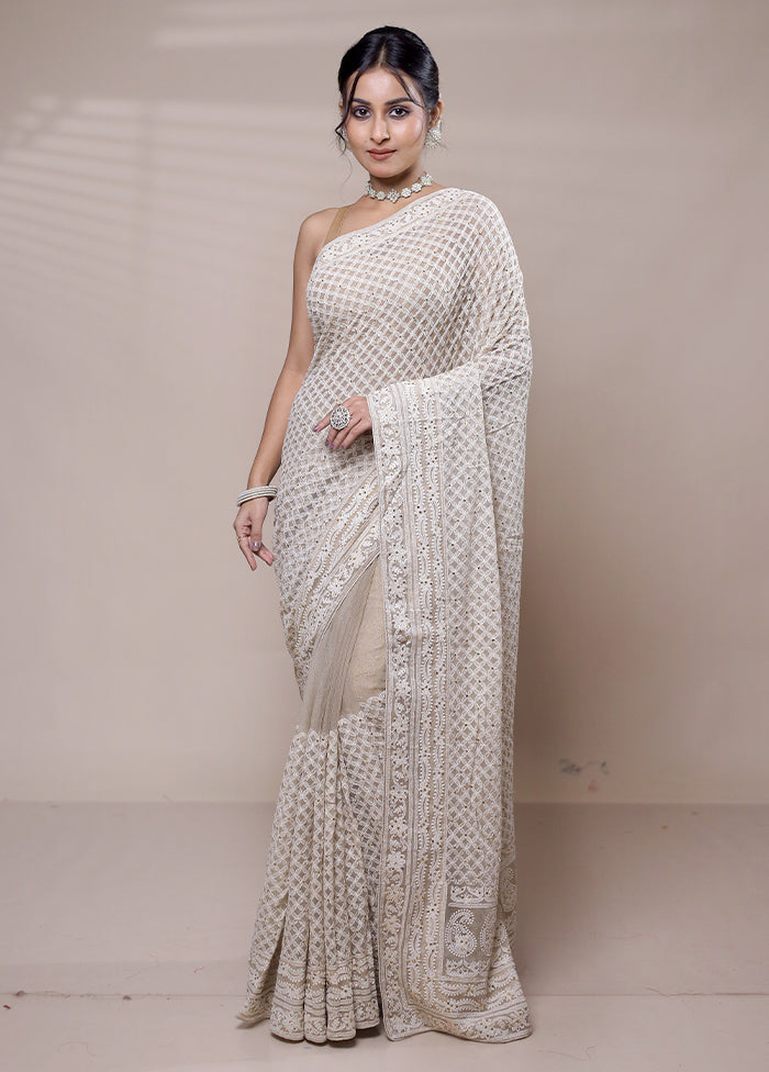 Cream Net Saree With Blouse Piece