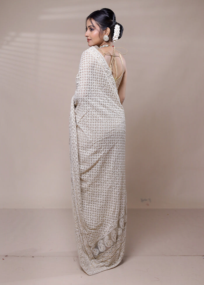 Cream Net Saree With Blouse Piece