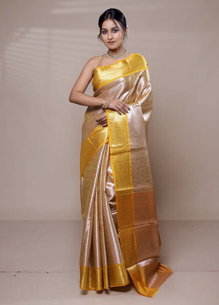 Cream Tissue Silk Saree With Blouse Piece