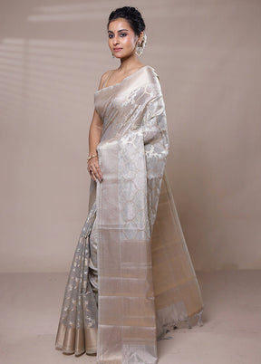 Cream Tissue Silk Saree With Blouse Piece