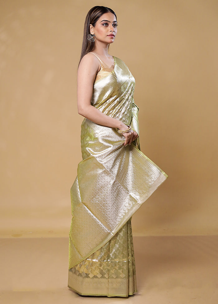 Green Tissue Silk Saree With Blouse Piece