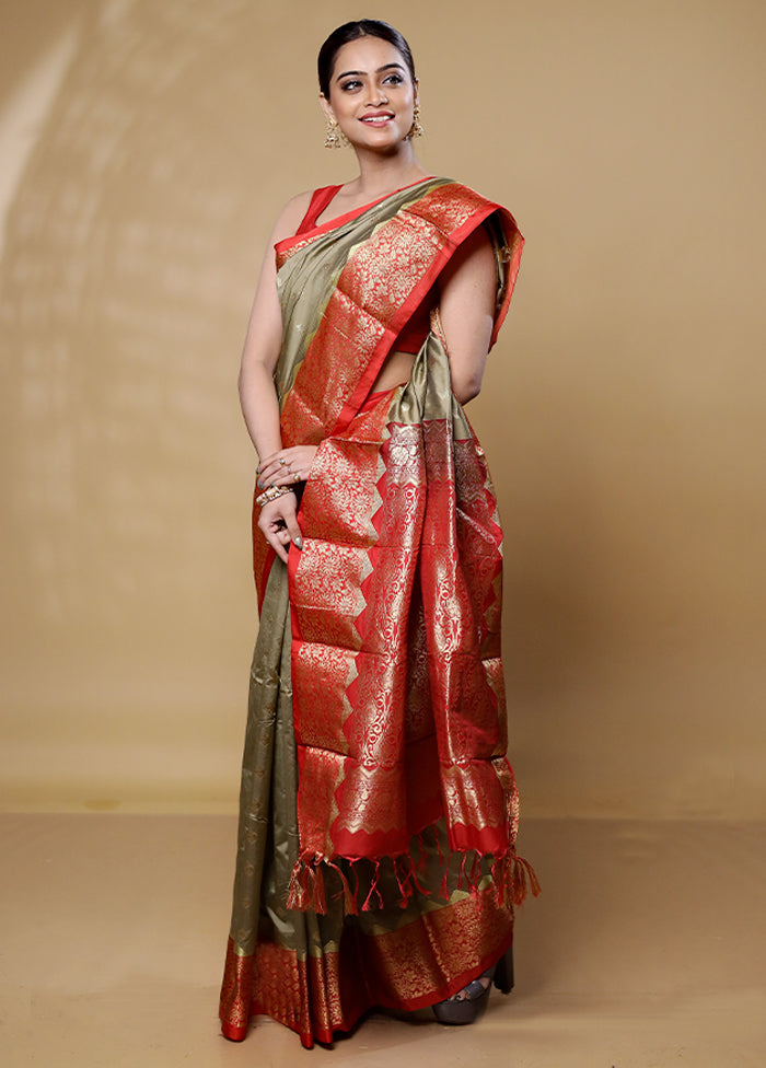 Green Kanjivaram Silk Saree With Blouse Piece