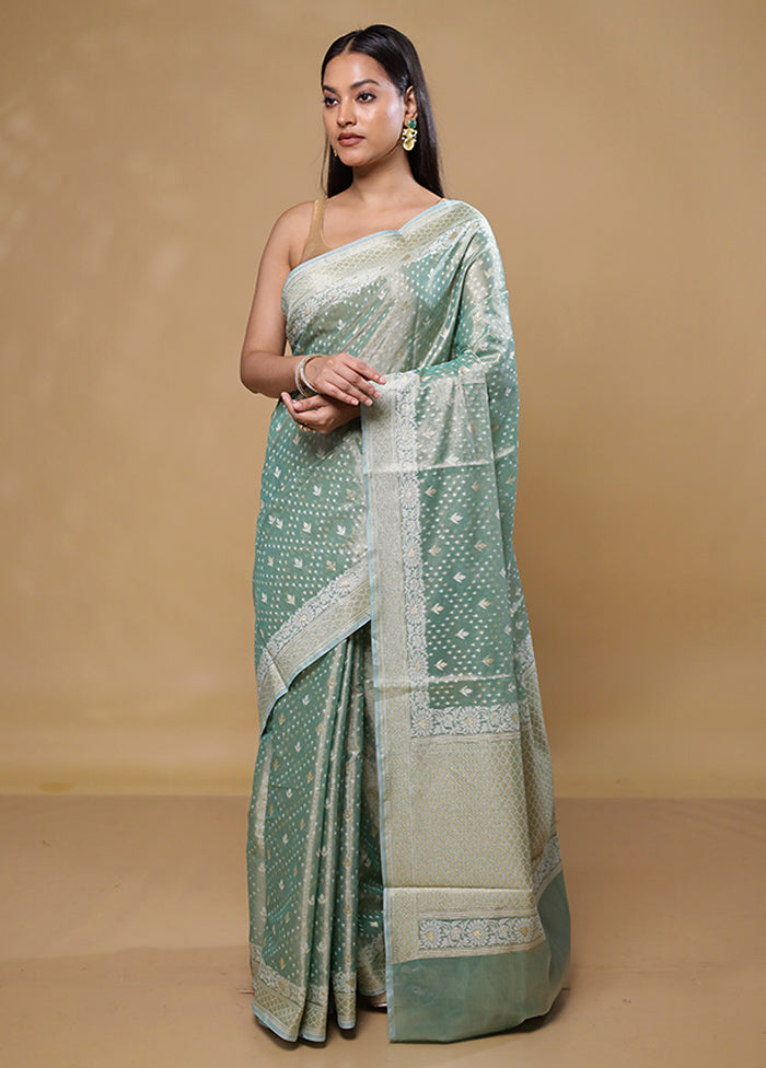 Green Tissue Silk Saree With Blouse Piece