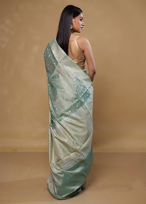 Green Tissue Silk Saree With Blouse Piece