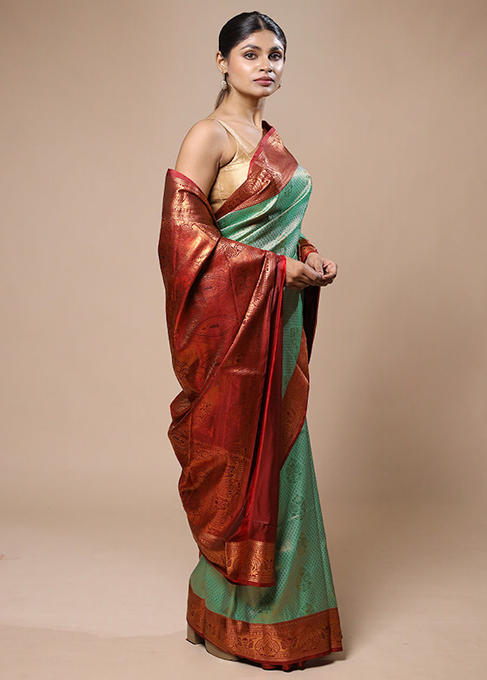 Green Kanjivaram Silk Saree With Blouse Piece