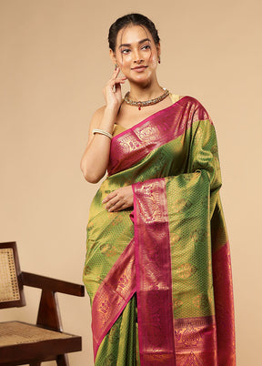 Green Kanjivaram Silk Saree With Blouse Piece