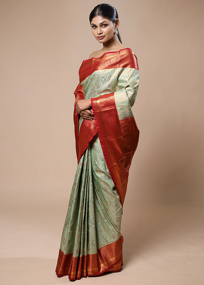 Green Kanjivaram Silk Saree With Blouse Piece