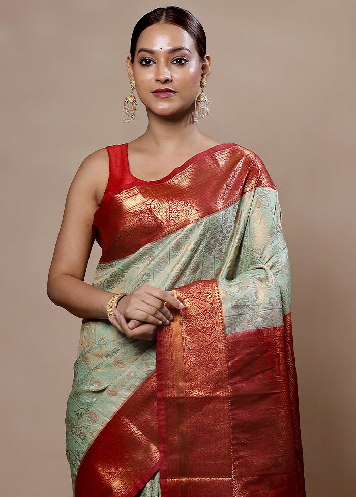 Green Kanjivaram Silk Saree With Blouse Piece