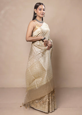 Cream Tissue Silk Saree With Blouse Piece