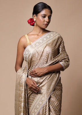 Cream Tissue Silk Saree With Blouse Piece