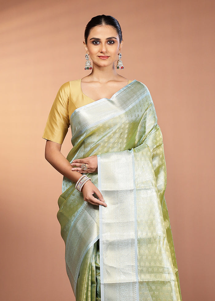Green Tissue Silk Saree With Blouse Piece