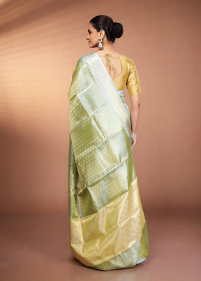 Green Tissue Silk Saree With Blouse Piece