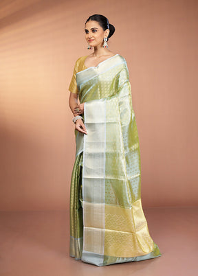 Green Tissue Silk Saree With Blouse Piece