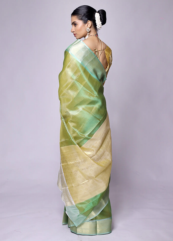 Green Tissue Silk Saree With Blouse Piece