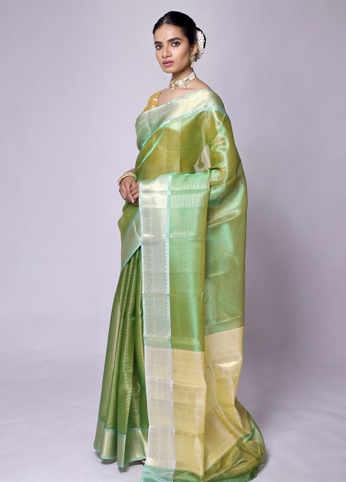 Green Tissue Silk Saree With Blouse Piece