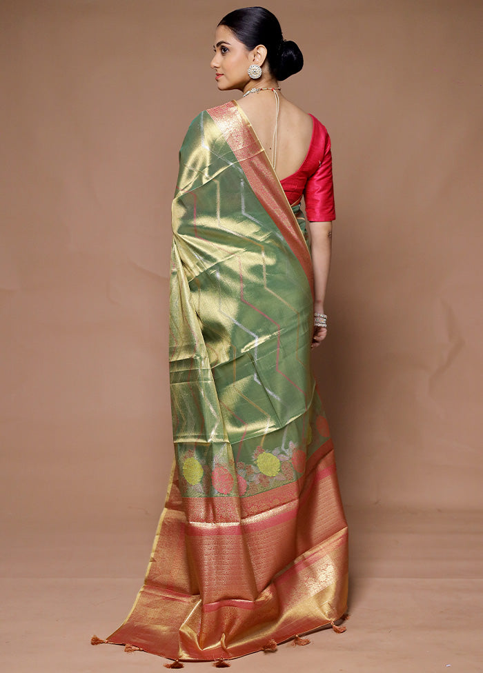 Green Tissue Silk Saree With Blouse Piece