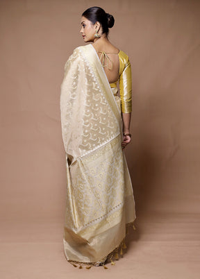 Cream Tissue Silk Saree With Blouse Piece