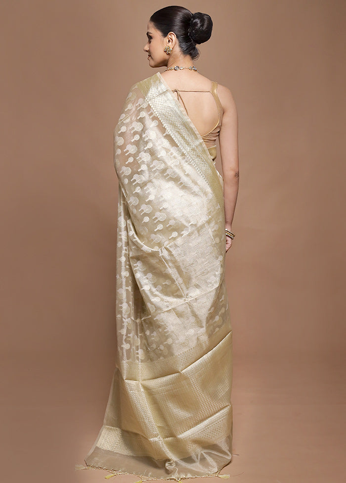 Cream Tissue Silk Saree With Blouse Piece