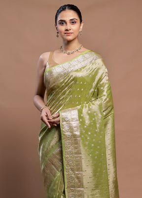 Green Tissue Silk Saree With Blouse Piece