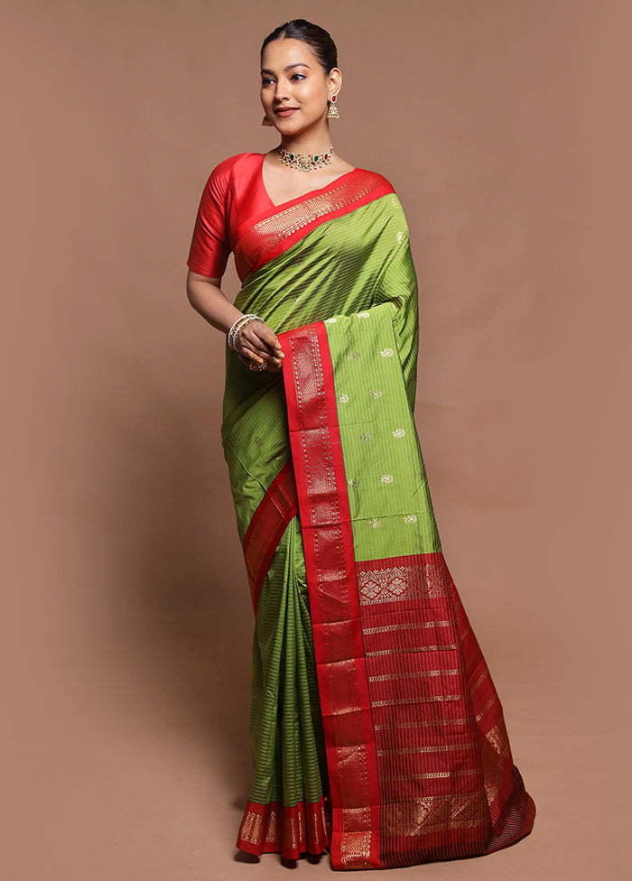 Green Kanjivaram Silk Saree With Blouse Piece