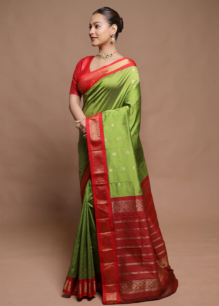 Green Kanjivaram Silk Saree With Blouse Piece