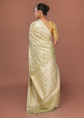 Green Tissue Silk Saree With Blouse Piece