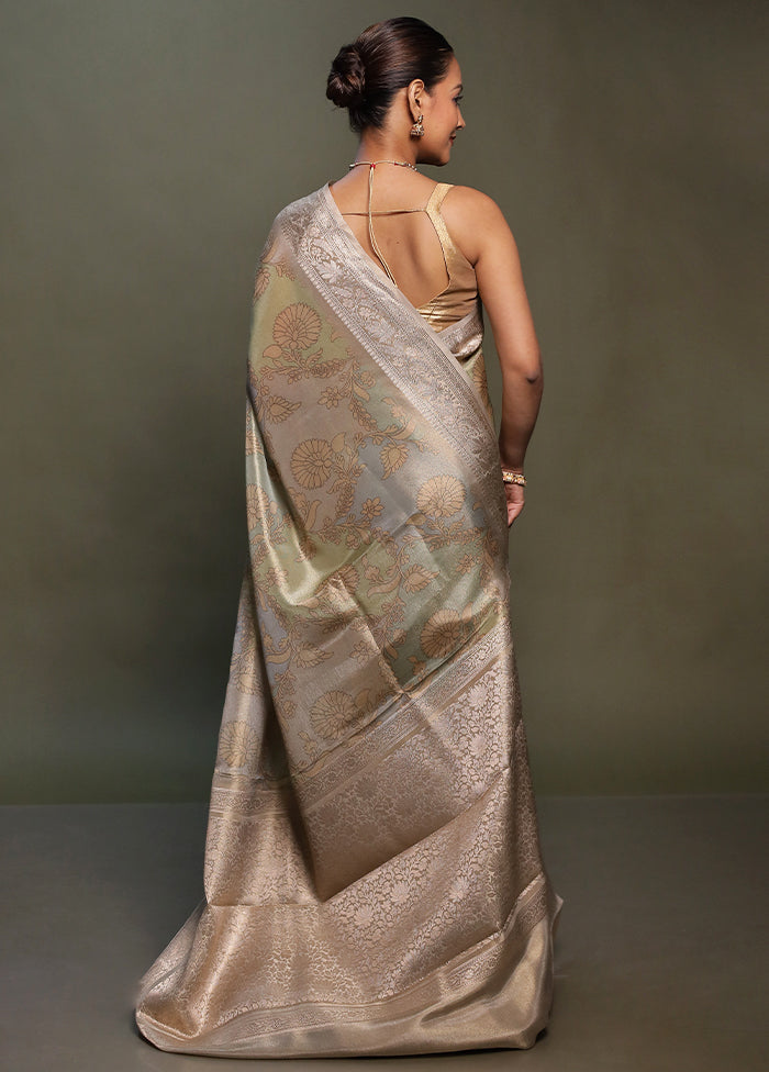 Green Tissue Silk Saree With Blouse Piece