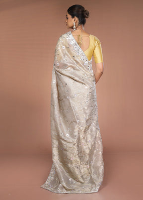 Cream Tissue Silk Saree With Blouse Piece