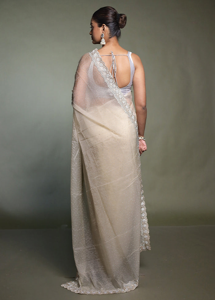 Cream Crushed Tissue Silk Saree With Blouse Piece