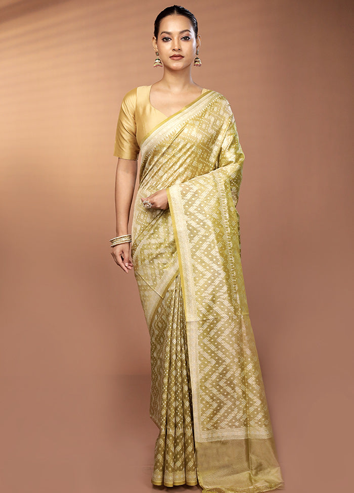 Green Tissue Silk Saree With Blouse Piece