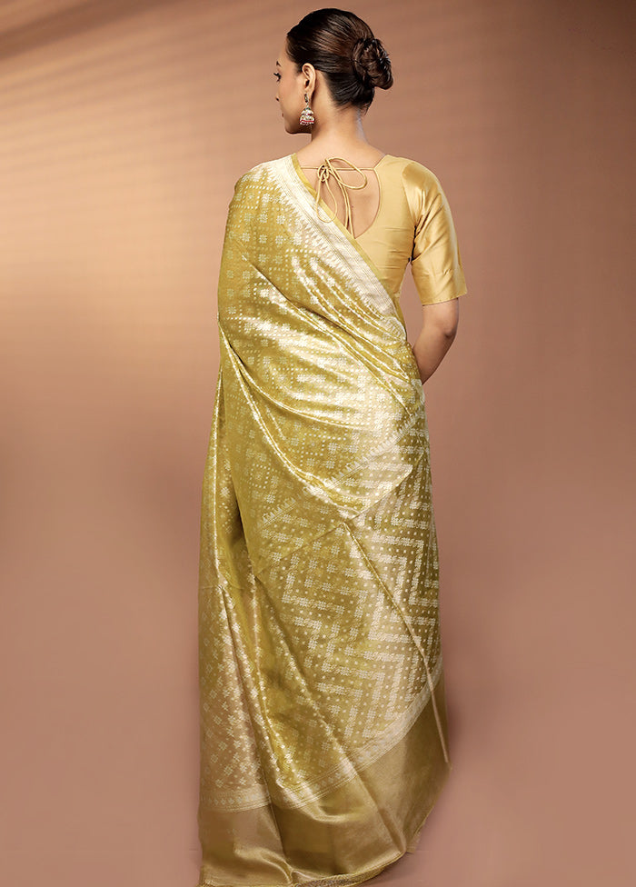 Green Tissue Silk Saree With Blouse Piece