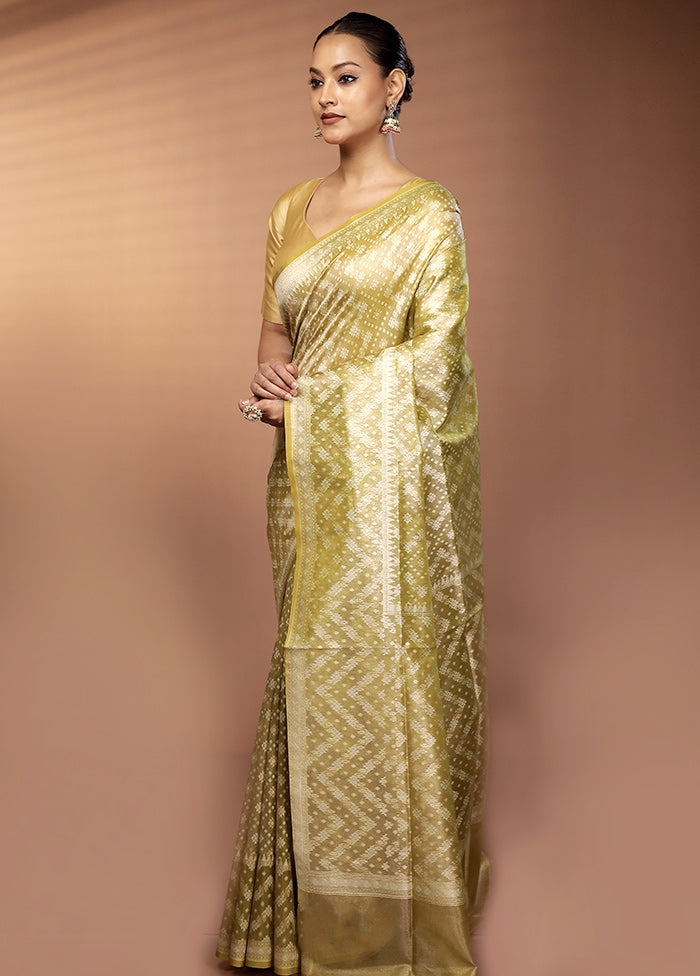 Green Tissue Silk Saree With Blouse Piece