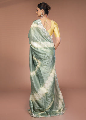 Green Tissue Silk Saree With Blouse Piece
