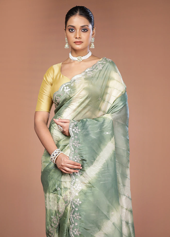 Green Tissue Silk Saree With Blouse Piece