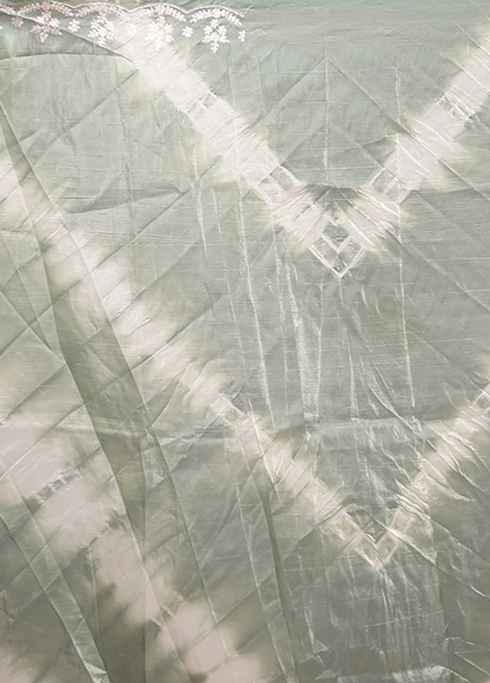 Green Tissue Silk Saree With Blouse Piece