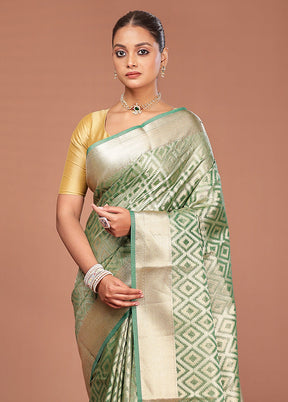 Green Tissue Silk Saree With Blouse Piece