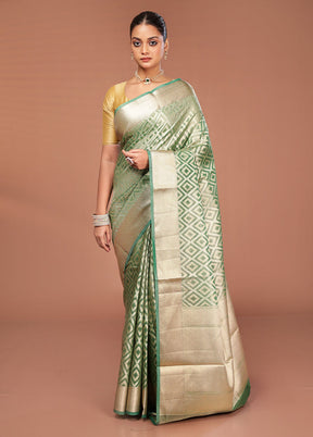 Green Tissue Silk Saree With Blouse Piece